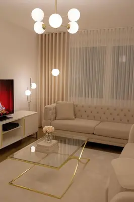 a living room with a couch and a table at Acharnon home in Athens