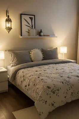a bedroom with a bed with a comforter at Acharnon home in Athens