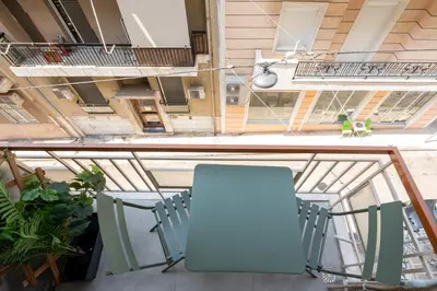 an overhead view of a balcony with a table and chairs at 1BR Modern & Cozy Apt Near Metro and Acropolis in Athens