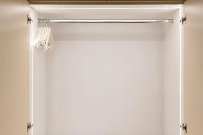 an open door of a closet with a curtain at 1BR Stylish Apt Near Metro, 15' From Acropolis in Athens