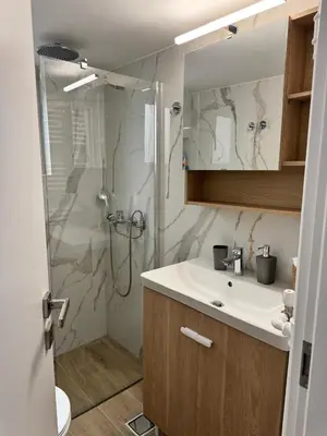 a bathroom with a shower and a sink and a shower at A&C Urban Elegance in Athens