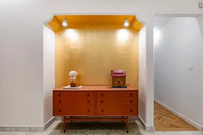 a dresser in a room with a wall at Elysia - Crafted 2-Bedroom Apt & Balcony in Athens in Athens
