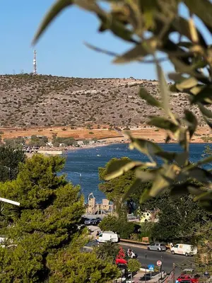 a view of a body of water with a hill at Apt 1' From The Sea With Private Terrace & BBQ in Vari