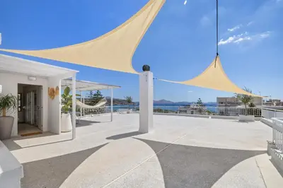 a large yellow tent on the roof of a building at Apt 1' From The Sea With Private Terrace & BBQ in Vari