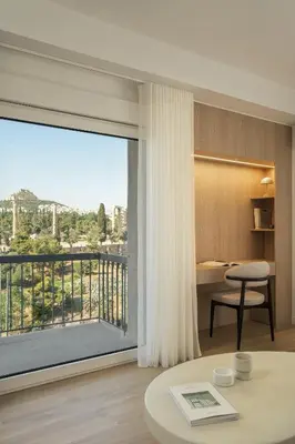 a living room with a large window with a view at Metro Acropolis, 117sqm luxury 3BDR, SuperViewAthens in Athens