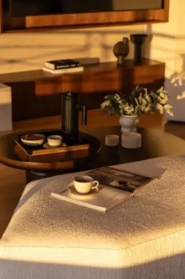 a table with a cup of coffee on a tray at Urban Forty One Acropolis-view penthouse in Athens