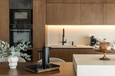 a kitchen with a table and a counter top at Urban Forty One Acropolis-view penthouse in Athens