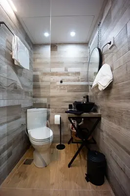 a bathroom with a toilet and a sink at Piraeus Harbor Hideaway in Piraeus