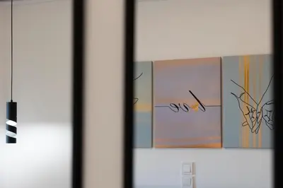 a picture of some paintings on a door at Piraeus Harbor Hideaway in Piraeus