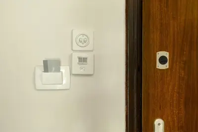a close up of a door with a light switch at Urban Νest in Athens next to Caravel in Athens