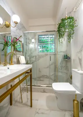 a bathroom with a shower and a toilet and a sink at Urban Νest in Athens next to Caravel in Athens