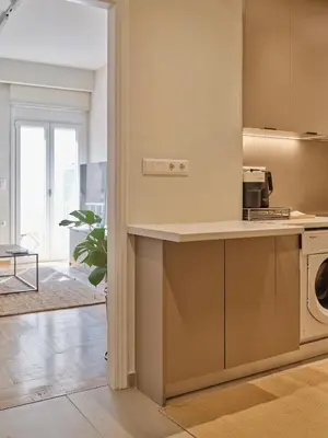 a kitchen with a washer and dryer on a counter at Real Athens K17 in Athens