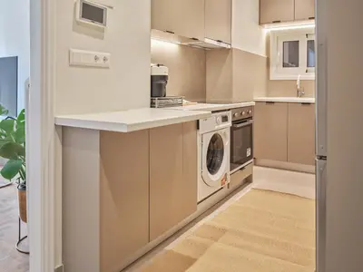 a kitchen with a washer and dryer at Real Athens K17 in Athens