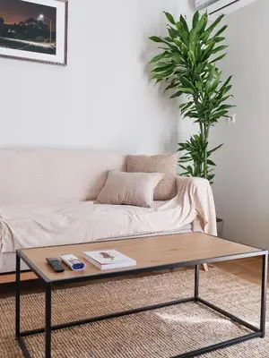 a living room with a couch and a coffee table at Real Athens K17 in Athens