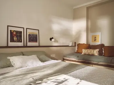 a bedroom with a bed and a couch at Melpomeni House in Athens