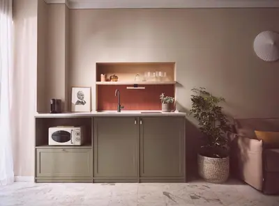 a kitchen with a sink and a microwave at Melpomeni House in Athens