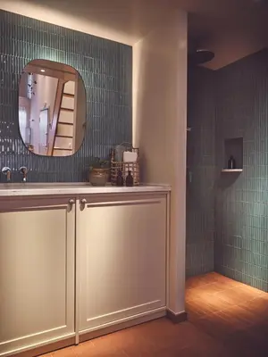 a bathroom with a sink and a mirror at Melpomeni House in Athens