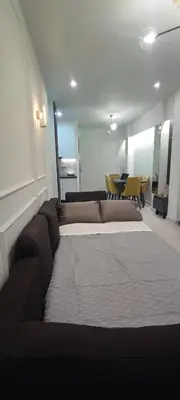 a living room with a couch and a table at Napoleon Modern apartment in Athens - Victoria Station in Athens