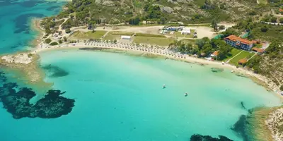 an aerial view of a beach with a group of people at Beachfront Lagonisi Apt 1 Minute From Grand Resort in Kalívia Thorikoú