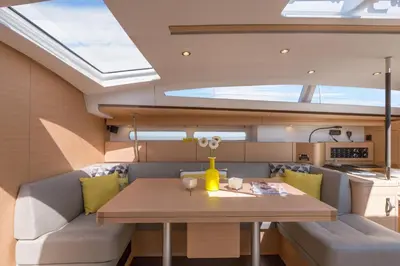 a dining room and kitchen on a yacht at Sailing boat house in Athens