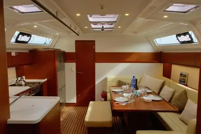 a small kitchen with a table in a boat at Sailing boat house in Athens