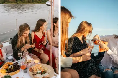 a group of people sitting on a boat drinking wine at Sailing boat house in Athens