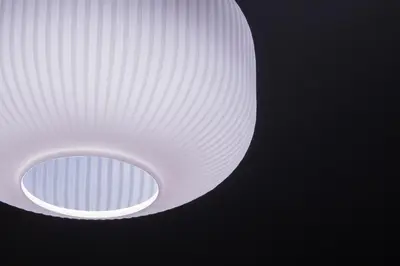 a white light fixture on a black background at The Athenian Elegance , Luxury 2 br near Hilton District in Athens