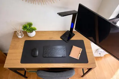 a desk with a computer monitor and a keyboard and mouse at Deep Blue Luxury Escape Heated Pool & Sea View in Saronida