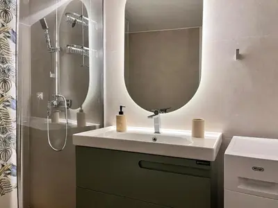 a bathroom with a sink and a mirror at Earthy Retreat in Central Athens Fully renovated in Athens