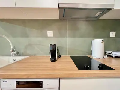 a kitchen with a counter top with a coffee maker at Earthy Retreat in Central Athens Fully renovated in Athens