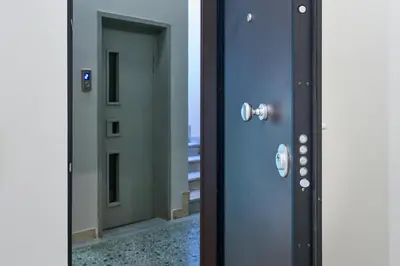 a door with a mirror and a door with a window at Penthouse in the heart of Athens in Athens
