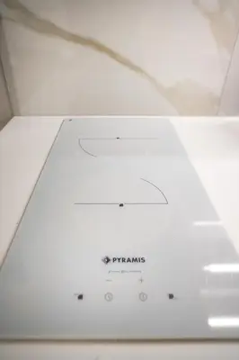 a white wii box sitting on top of a table at Koukaki Urban Suites in Athens