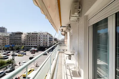 a balcony with a view of a city street at Panormou Neon - Urban Apartment 3B in Athens