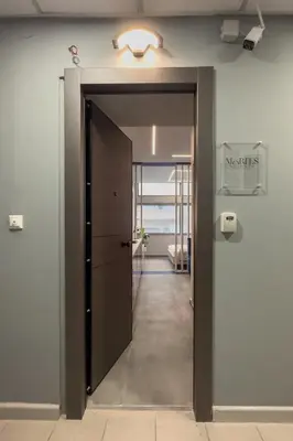 an open door in a room with a hallway at Morfes studio at historic center-near Acropolis in Athens
