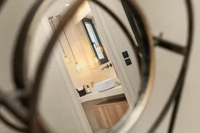 a view of a bathroom through a mirror at ESTER Metropolitan Luxe - 2 Bedrooms 2 Bathrooms in Athens