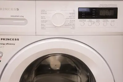 a close up of a washing machine at Panormou Neon - Urban Apartment 1A in Athens