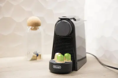 a hair dryer sitting on a table next to a toaster at Panormou Neon - Urban Apartment 2A in Athens