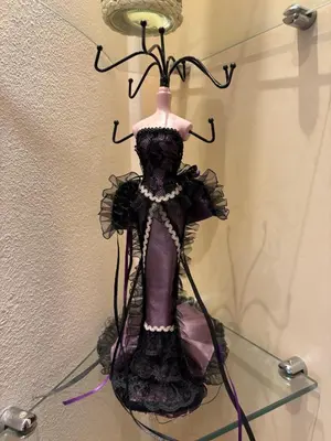 a dress on a mannequin on a glass shelf at Bright Koukaki Studio -10 min Walk to Acropolis in Athens