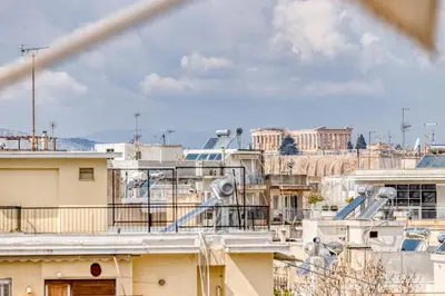 a view of the city from a building at Acropolis View Studio Varnava in Athens