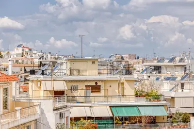 a view of the roofs of buildings at Acropolis View Studio Varnava in Athens