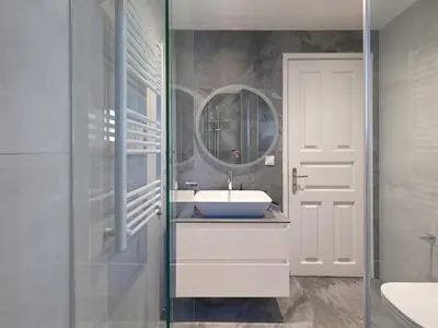 a bathroom with a sink and a mirror at Kalliannassa in Piraeus
