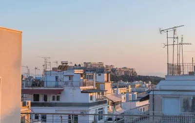 a view of a city with buildings at Kolonaki Penthouse - Acropolis View - 5min Metro in Athens