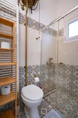 a bathroom with a toilet and a shower at City Panorama Studio by ΜΡS in Athens