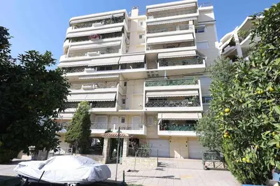 a large white building with a tent in front of it at Cosy and Comfy near Niarxos and Athens Riviera in Athens