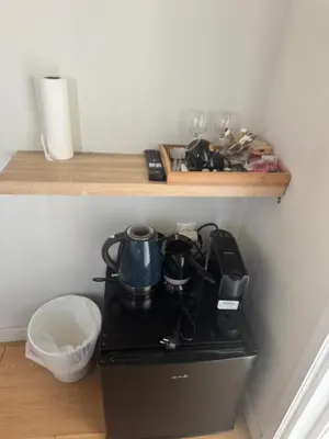 a stove with a tea pot on it in a kitchen at Nikiou 11 in Athens