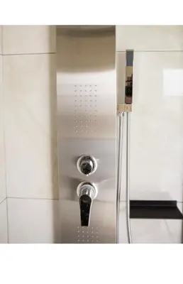a shower in a bathroom with a shower head at Athens view suite in Athens