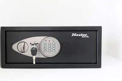 a microwave oven with a key in a black frame at Estia Residence Acropolis Apartment in Athens