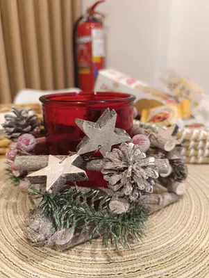 a table with a christmas decoration on a table at Studio 35 - Modern & Cozy Studio in Chalandri City Center in Athens