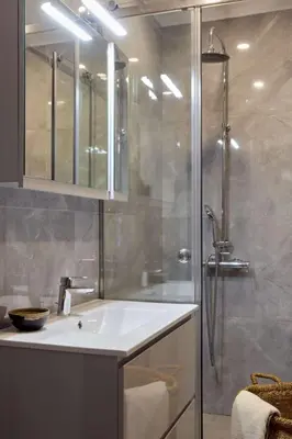 a bathroom with a sink and a shower at Villa Riviera in Vari