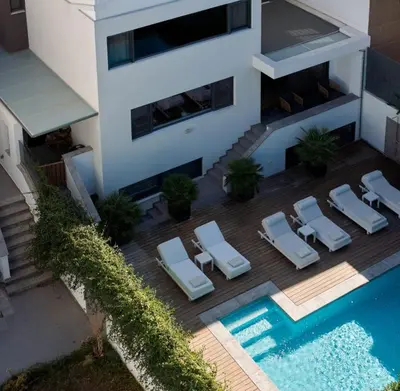 an aerial view of a house with a swimming pool at Villa Riviera in Vari